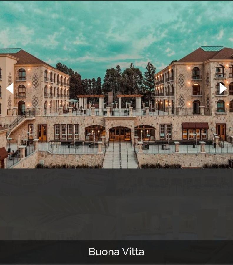 Buona Vitta Gramado Resort & Spa By Gramado Parks Exterior foto The photo shows a spacious and elegant building design, likely a hotel or resort. The structure features multiple stories and large windows, with outdoor seating areas visible on a terrace or patio. The exterior has a combination of stone and modern 